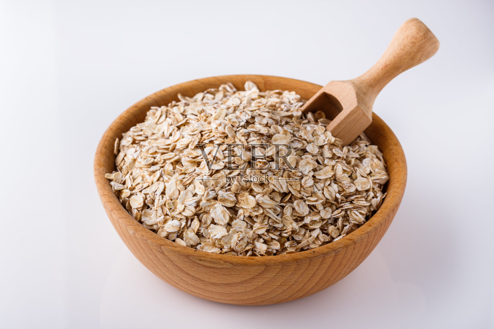 生燕麦片，白色丙烯酸背景照片摄影图片