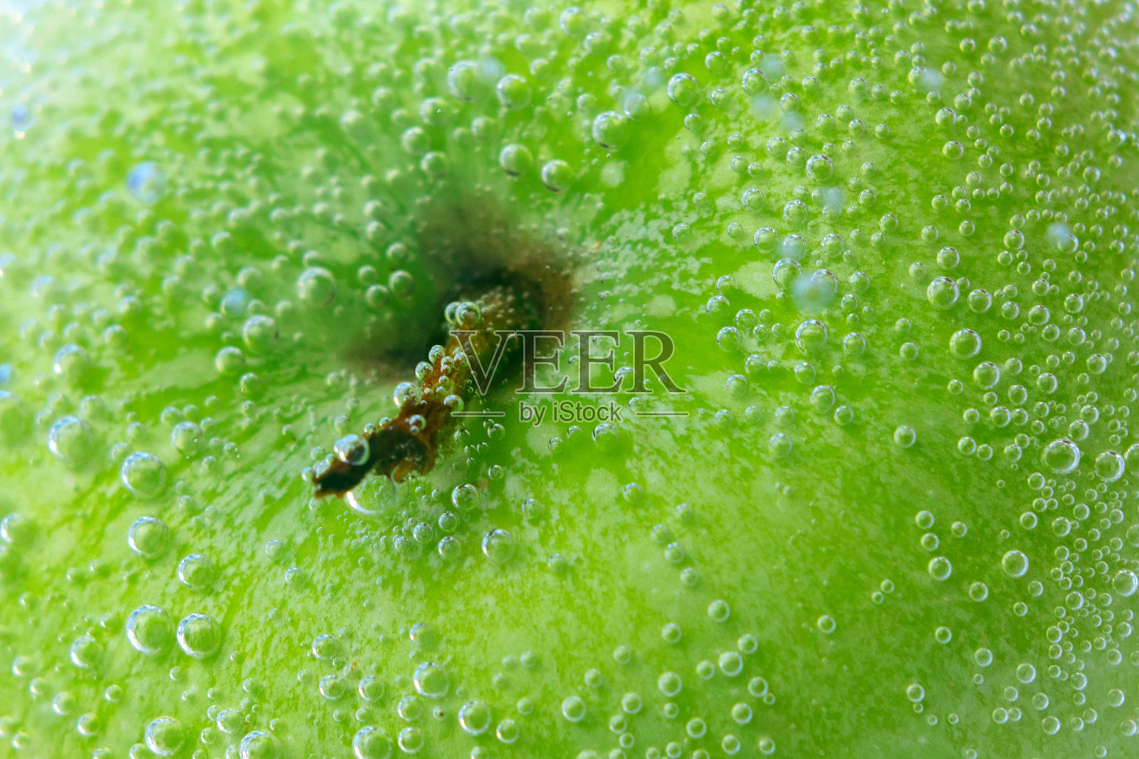 抽象的绿色苹果近景微距图像。有选择性的重点照片摄影图片