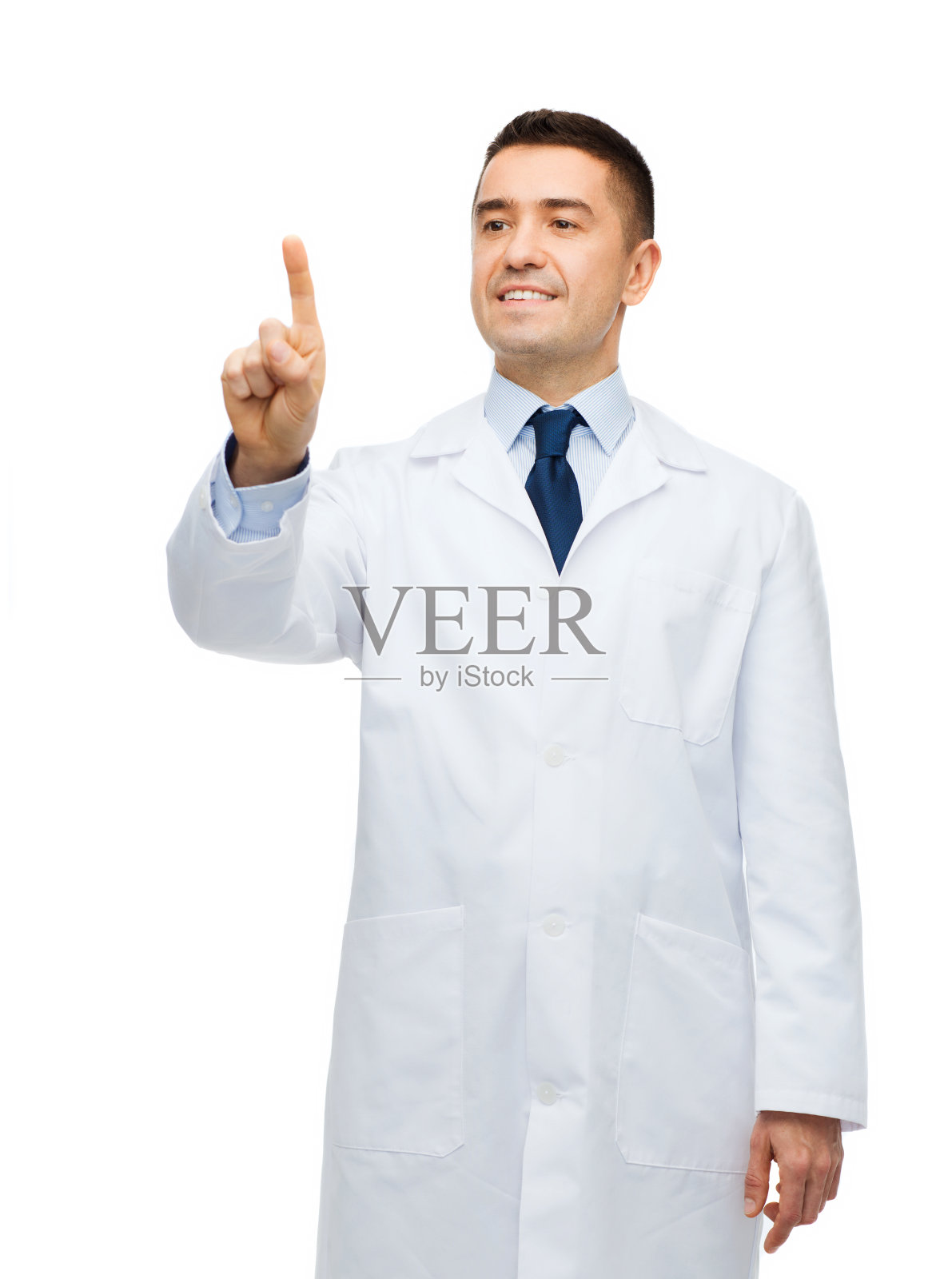 微笑的男医生身穿白大褂，指着照片摄影图片