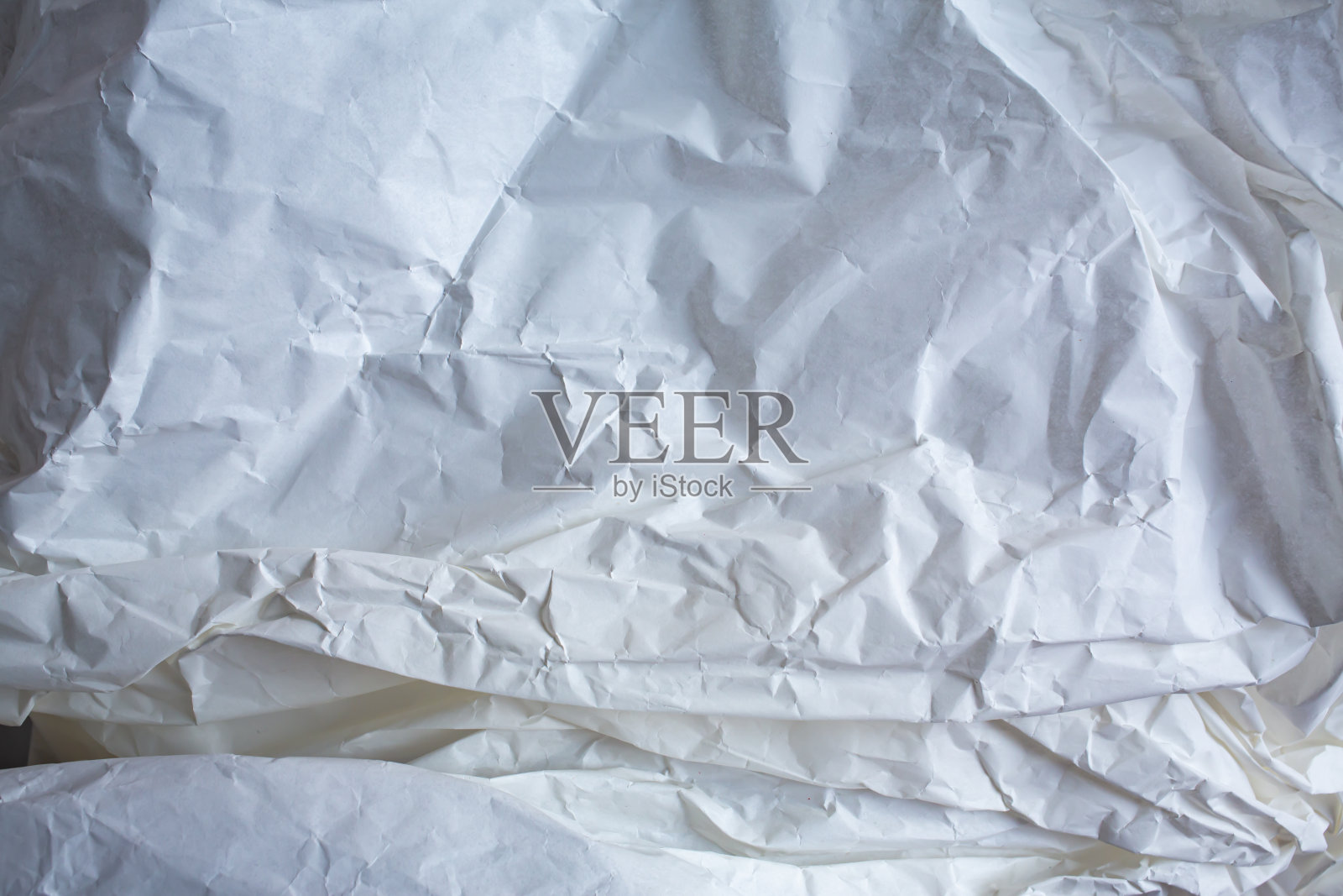 白色和灰色皱纸纹理背景，渐变色调，特写照片摄影图片