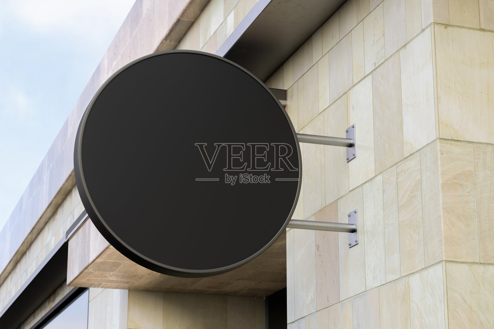 圆形的招牌或标志在大理石墙上与空白的黑色标志模拟。底部视图。照片摄影图片