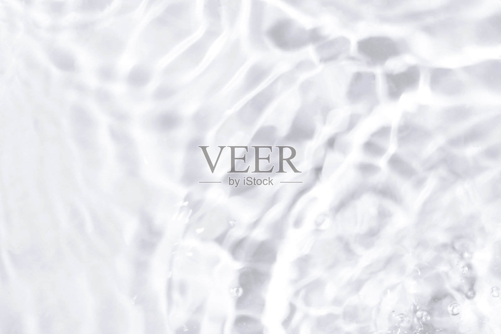 由水产生的阴影。照片摄影图片