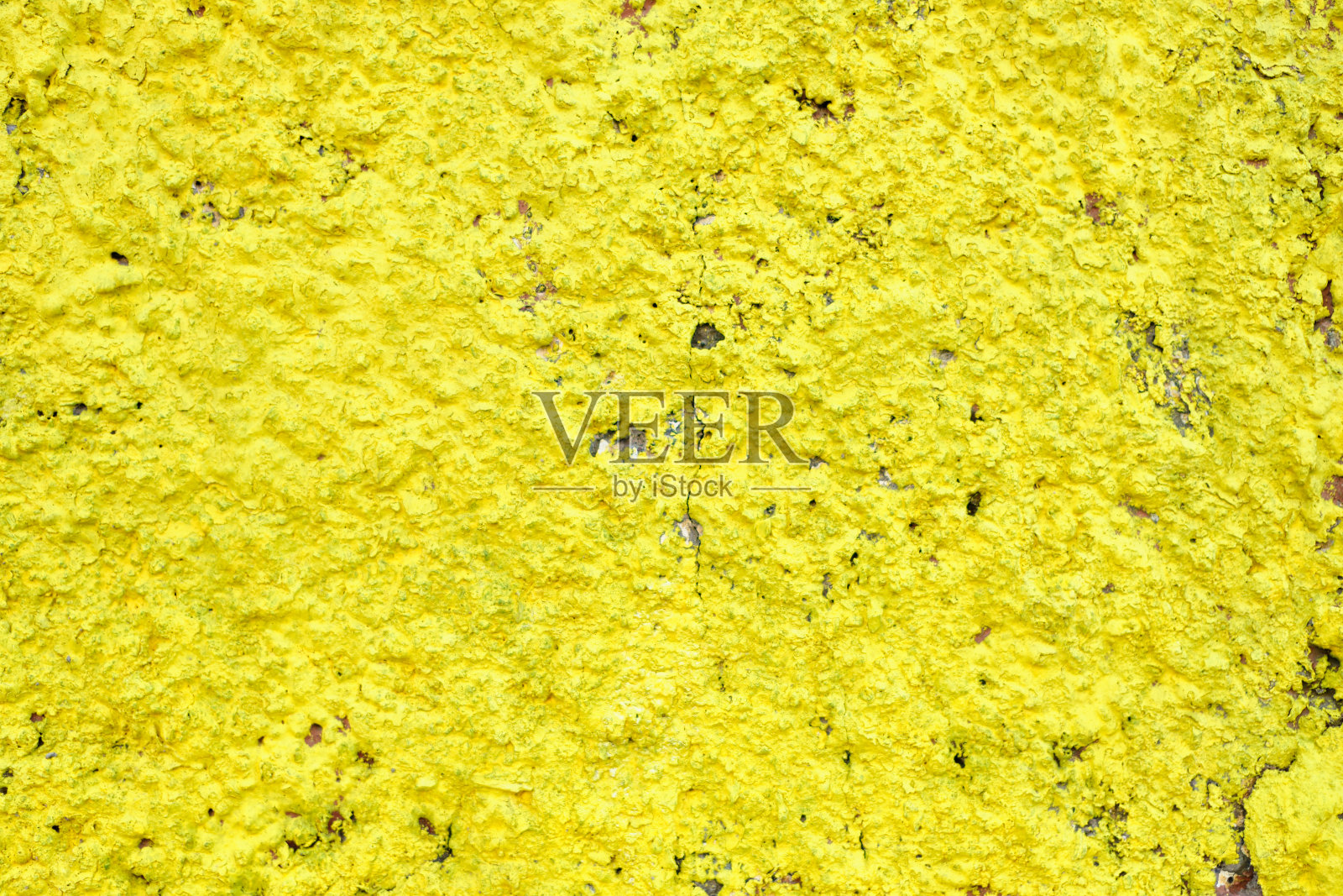 纹理和底色为黄色灰泥。照片摄影图片