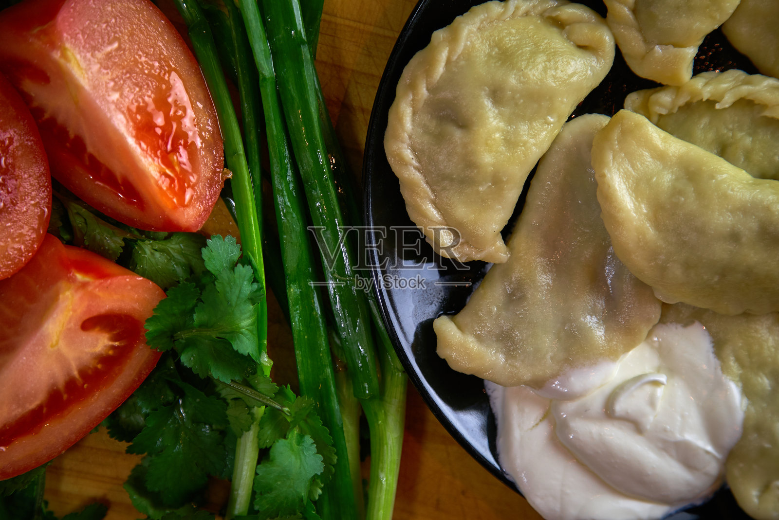乌克兰风味的酸奶油饺子照片摄影图片