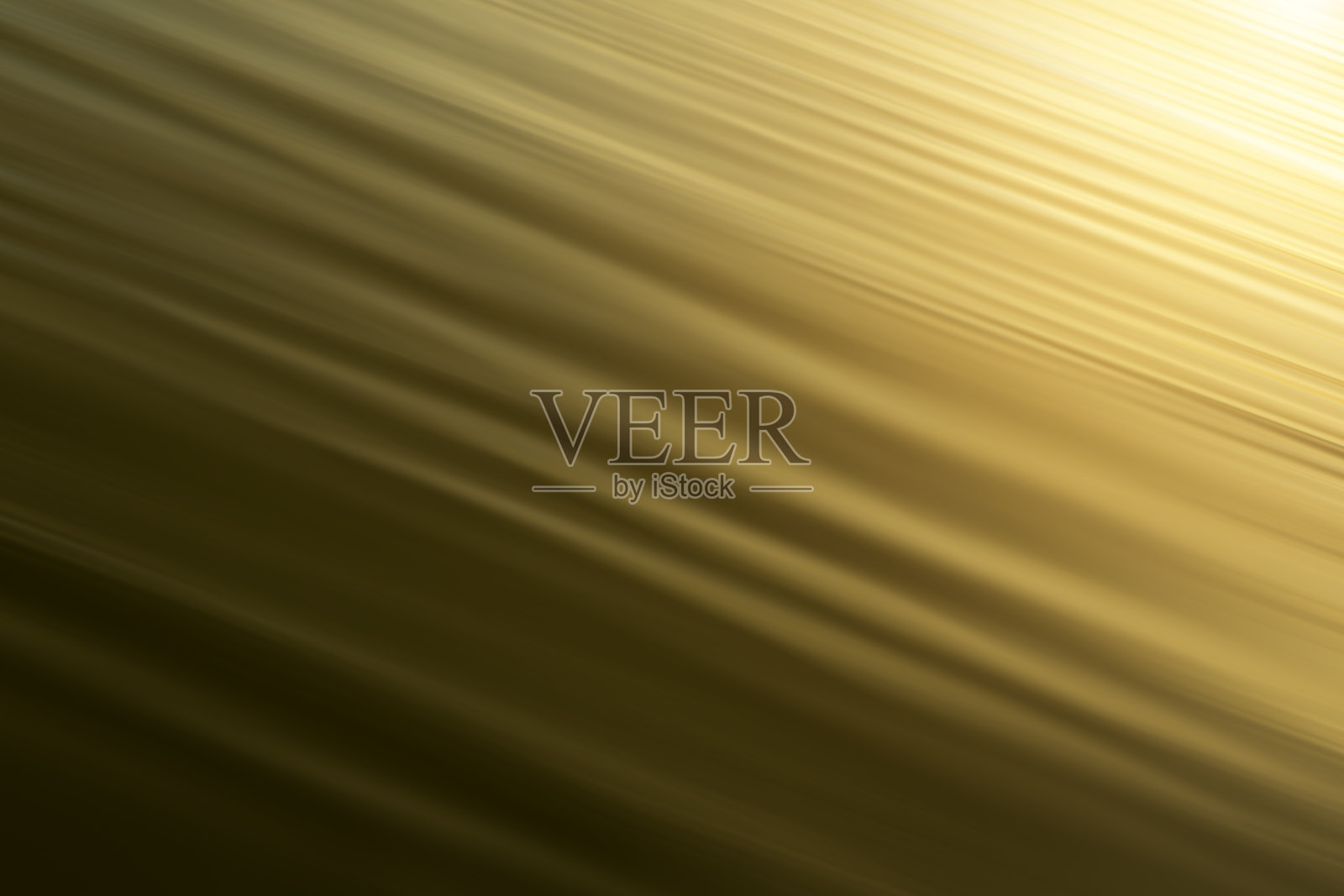 抽象的金色波浪在水面上闪烁着光芒。照片摄影图片