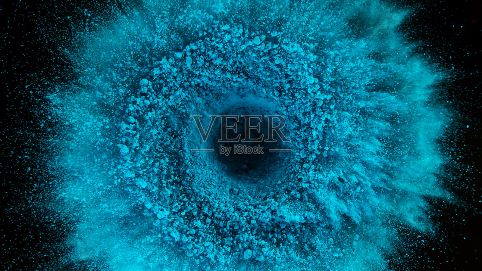 彩色粉末在黑色背景上爆炸照片摄影图片