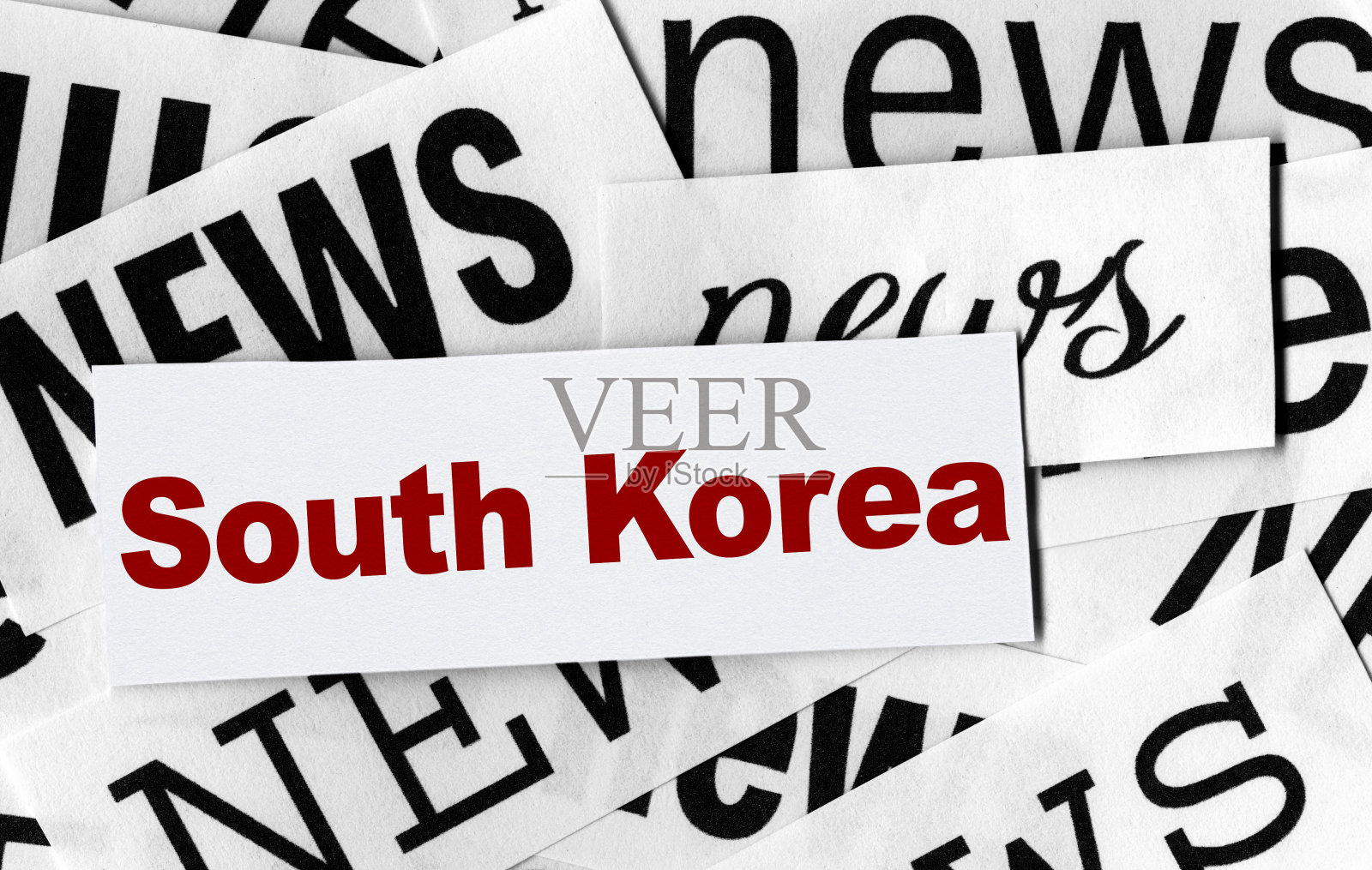 “新闻”字用不同字体，“韩国”字用红色字体居中照片摄影图片