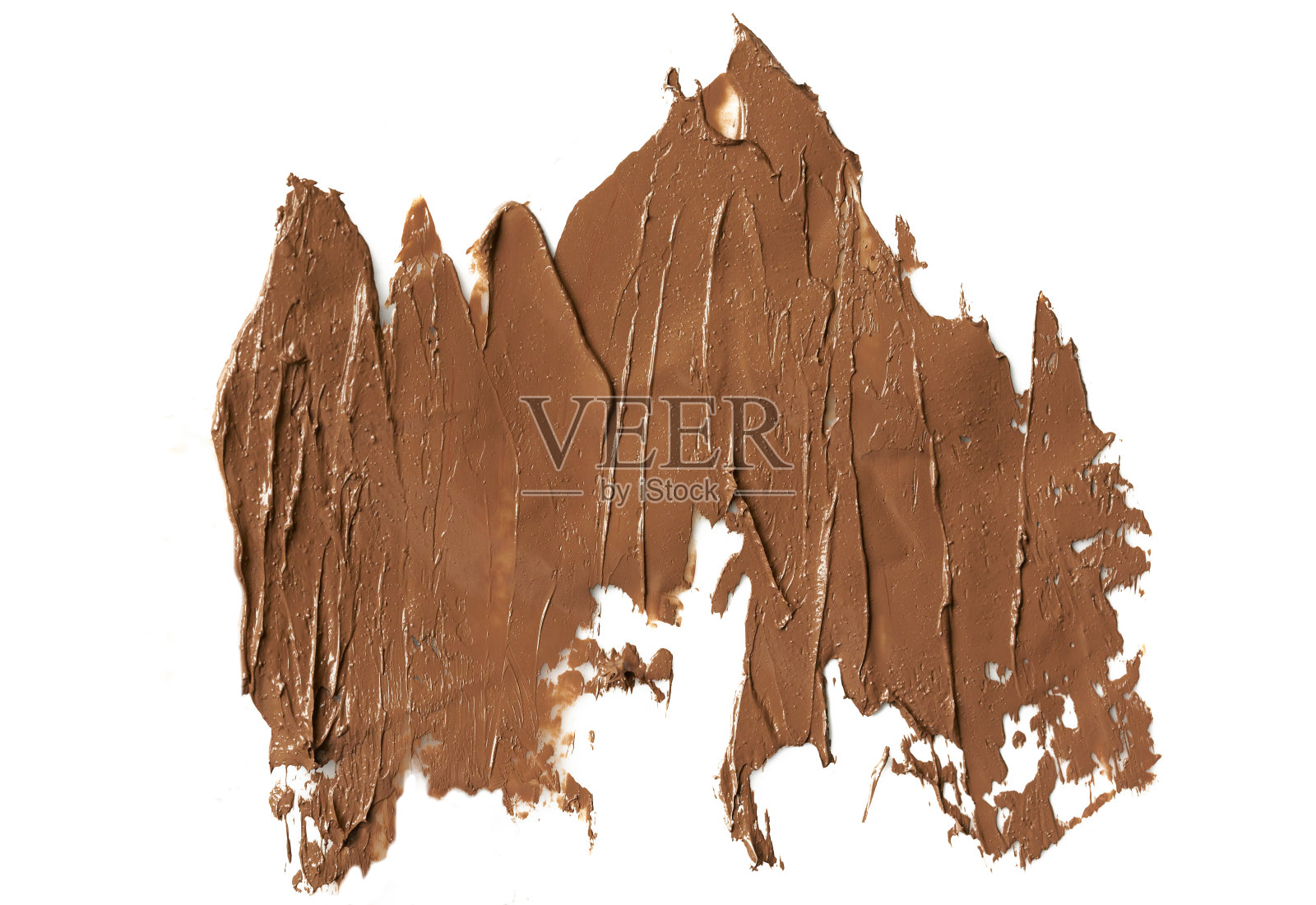 化妆用棕色遮瑕膏涂抹笔画孤立于白色背景上，调色霜涂抹纹理矫正器。弥补。照片摄影图片