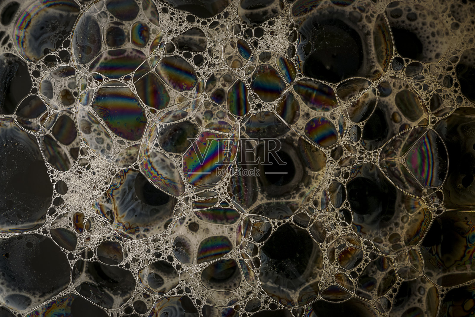 肥皂泡泡图案和设计形成的洗涤液体和液体肥皂。照片摄影图片