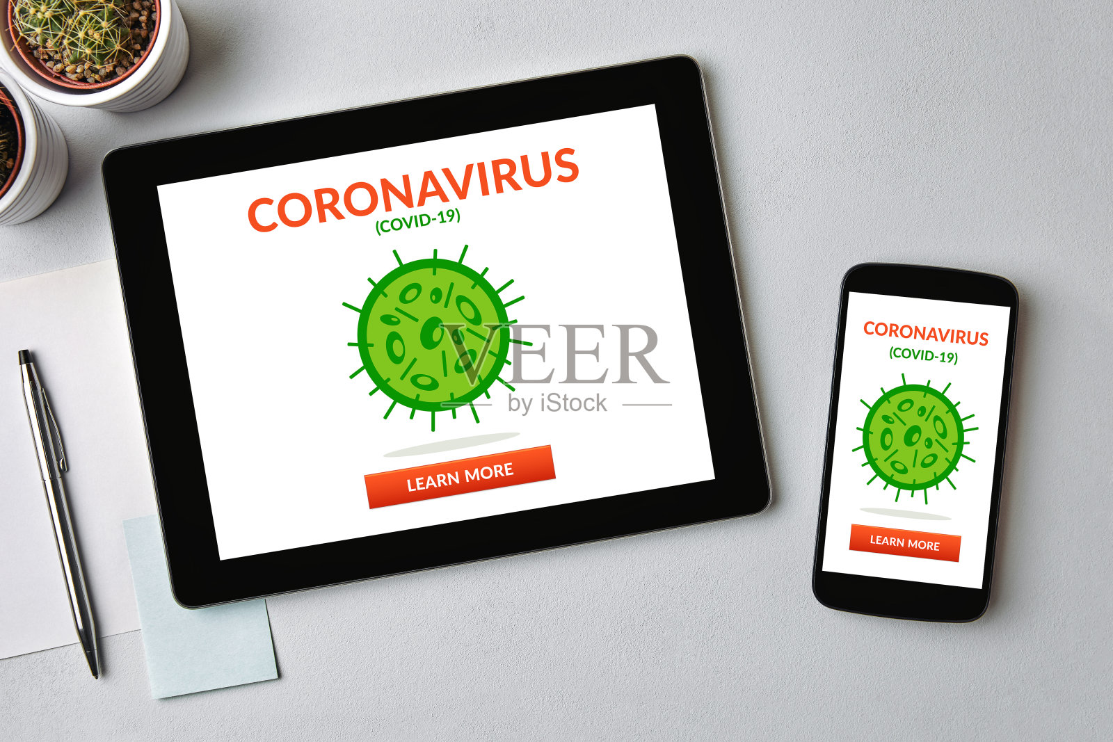 平板电脑和智能手机屏幕上的冠状病毒和covid-19概念照片摄影图片