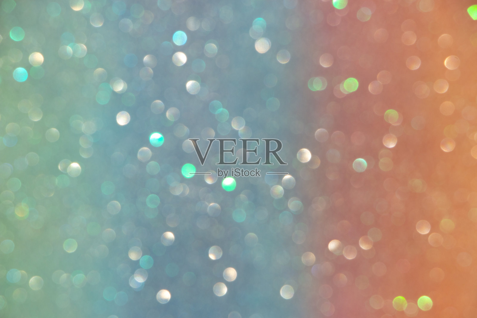 柔和的对焦，橙色背景上的散景。照片摄影图片