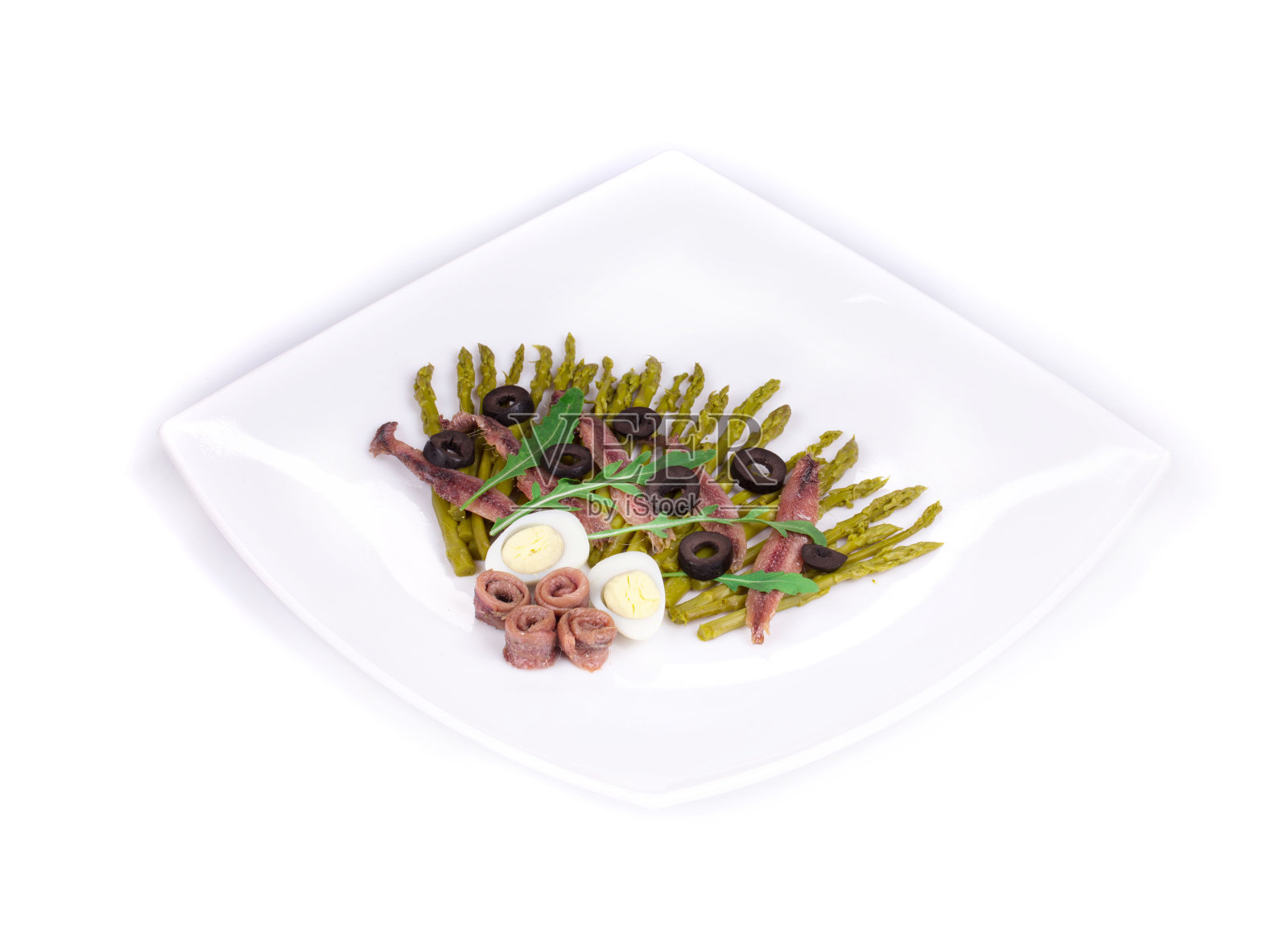 凤尾鱼芦笋沙拉。照片摄影图片