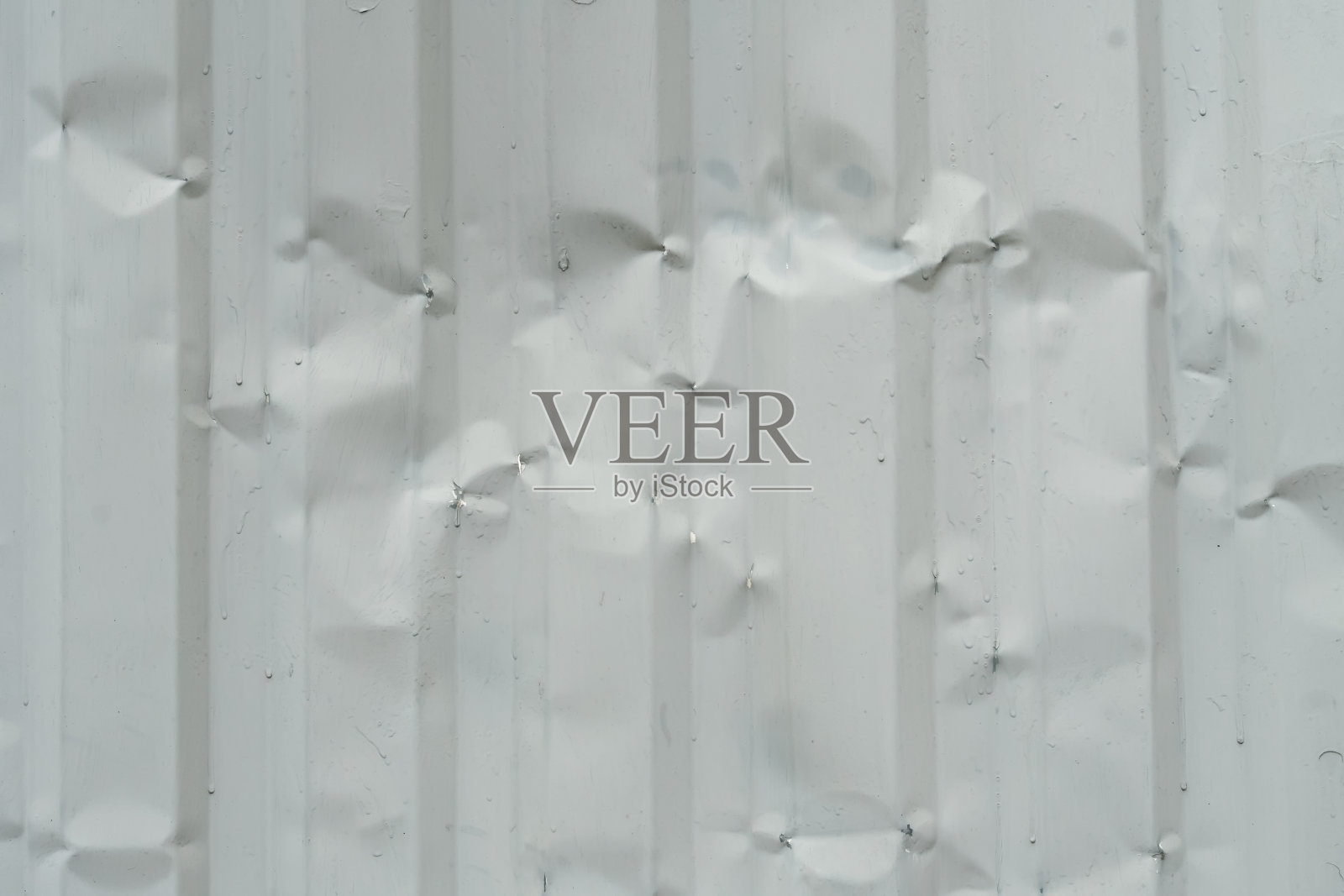 纹理，一个旧的灰色波纹金属栅栏的背景照片摄影图片