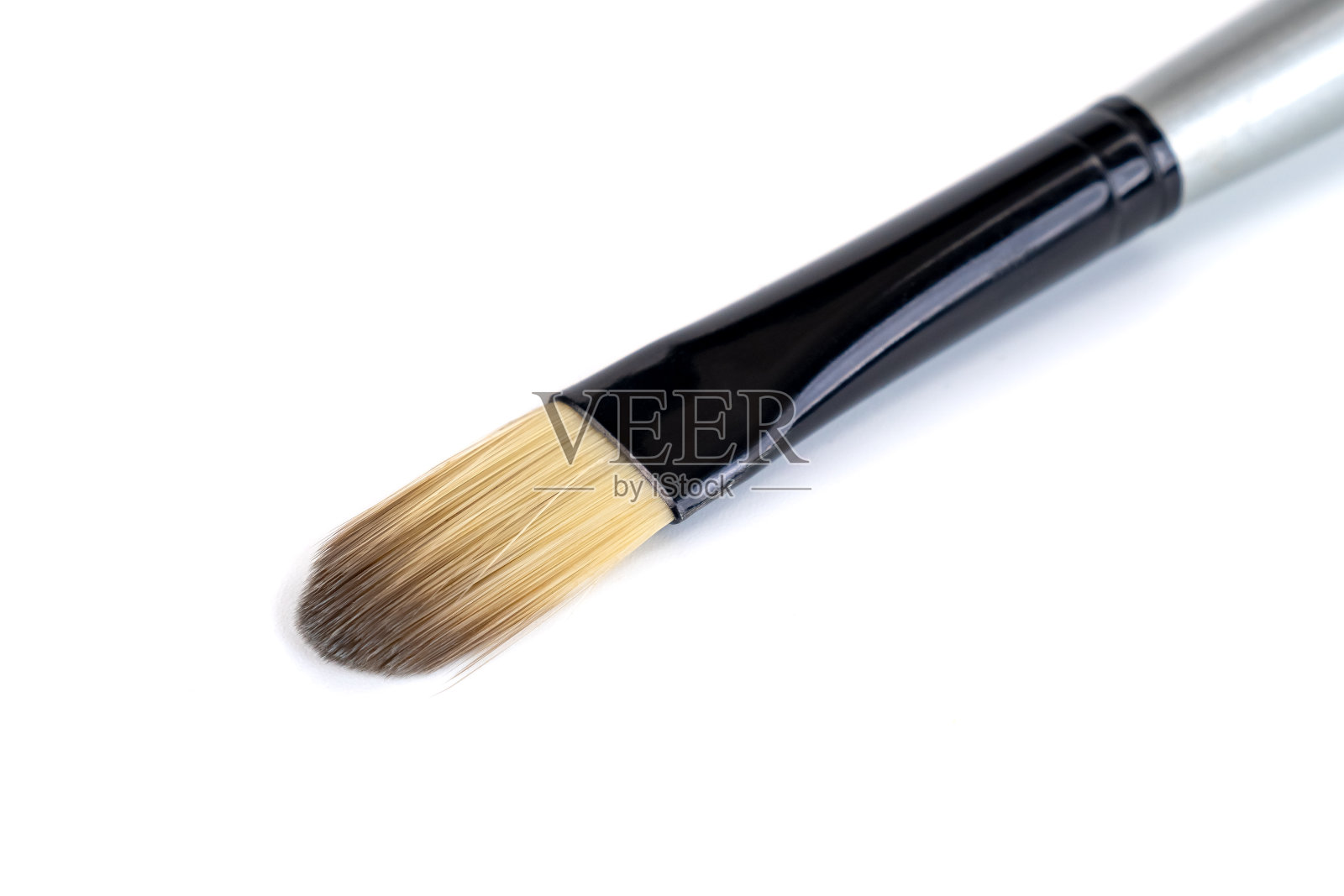 新油漆刷隔离在白色背景照片摄影图片