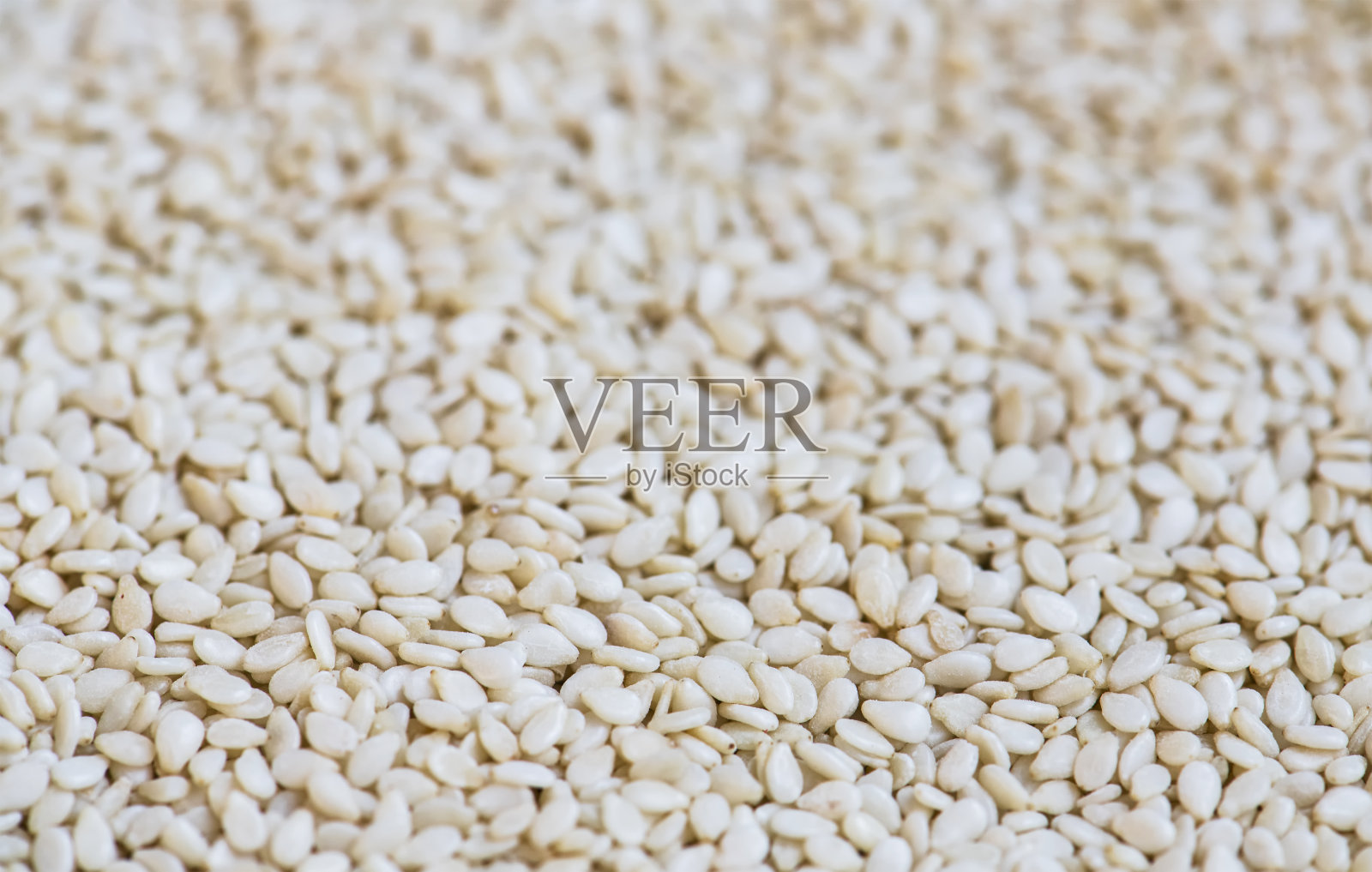 特写芝麻纹理。天然食品的背景。照片摄影图片