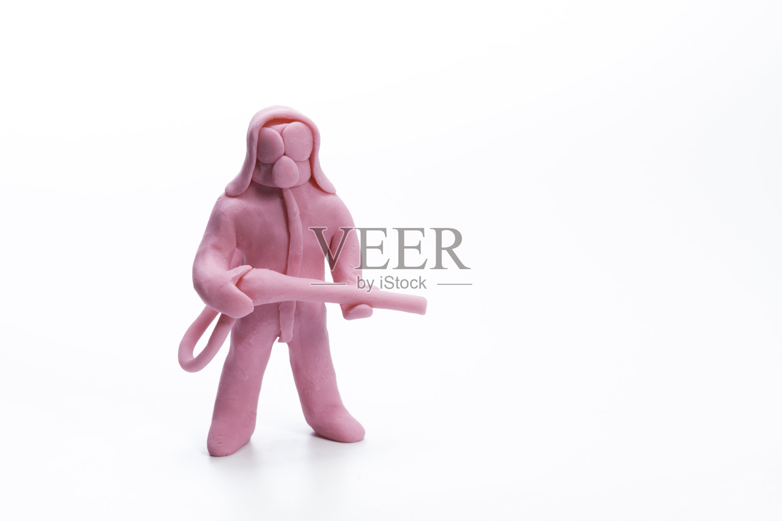 黏土或橡皮泥制成的士兵俑，装备好进行消毒处理照片摄影图片