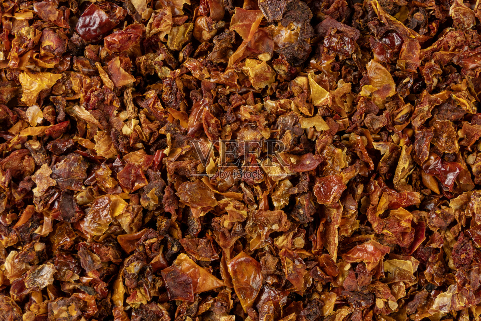 干番茄背景。天然调味料质地。香料和食物配料。照片摄影图片