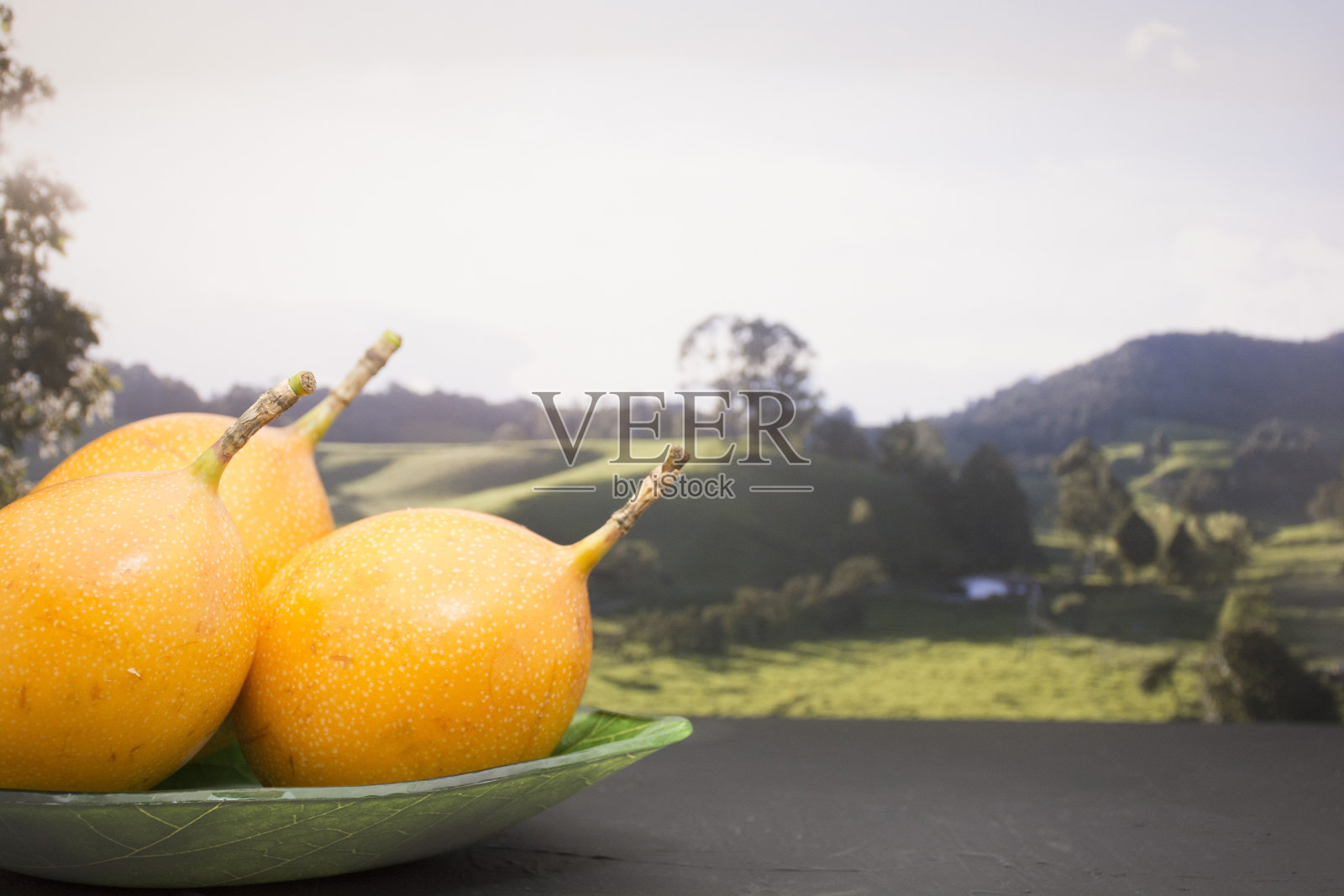 石榴，美味的热带水果，西番莲。照片摄影图片