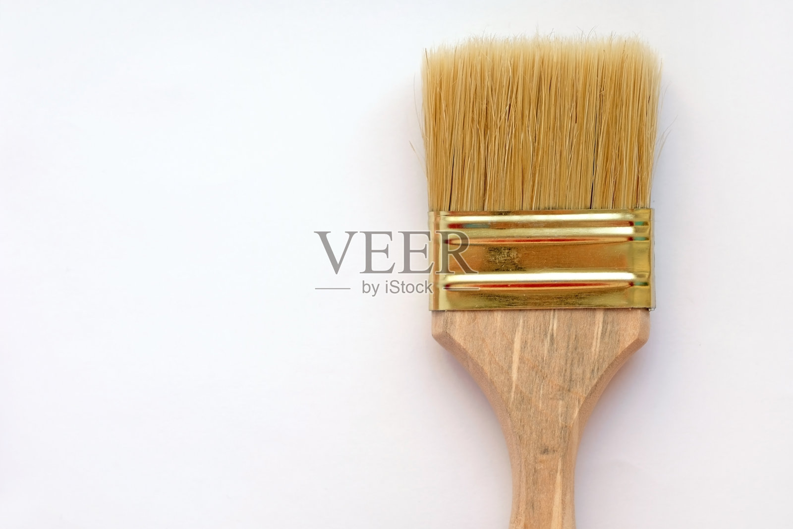 油漆刷用天然桩。在白色背景顶视图上绘制工具。照片摄影图片
