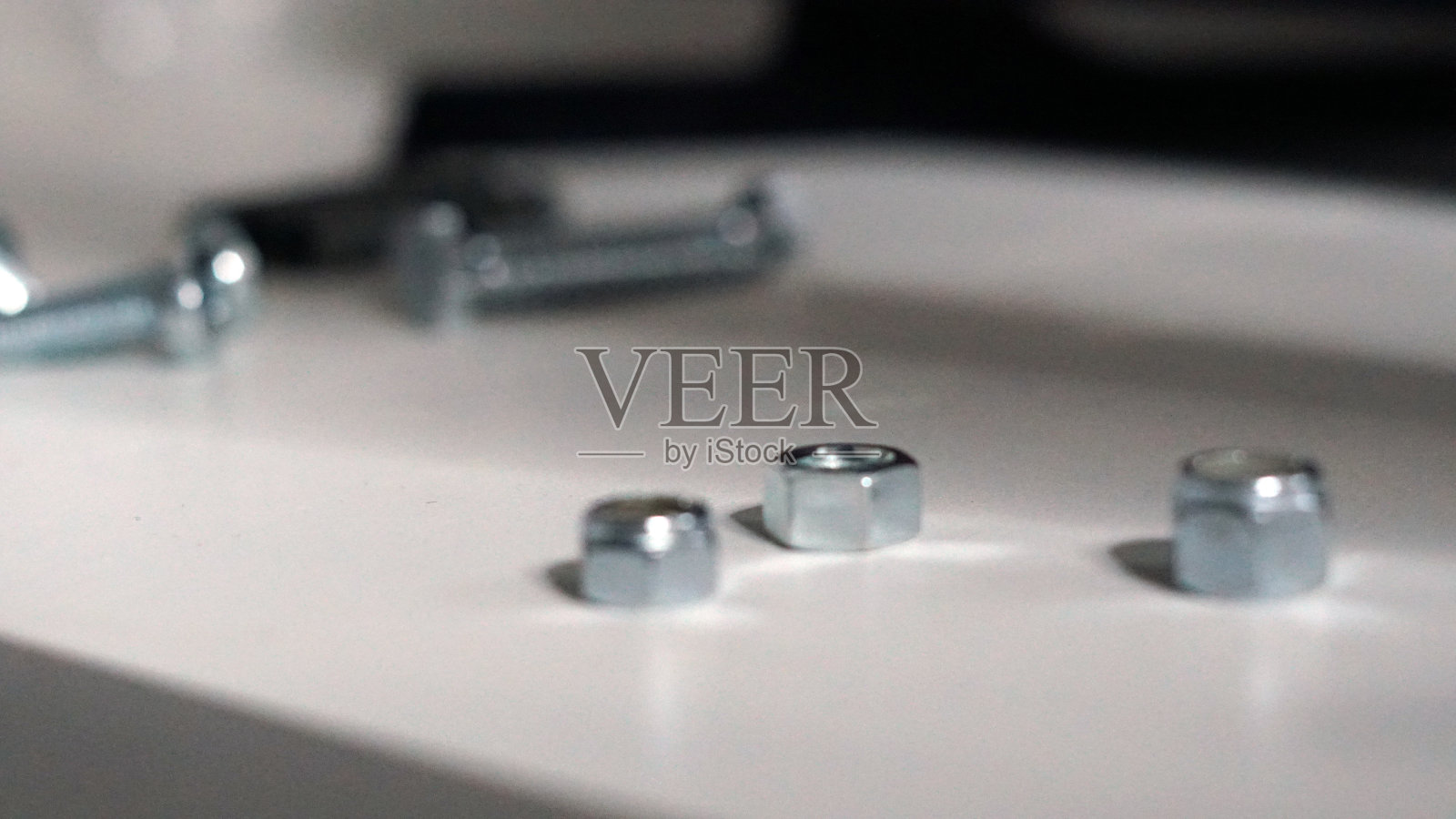 螺帽，钉子和螺丝自己做照片摄影图片