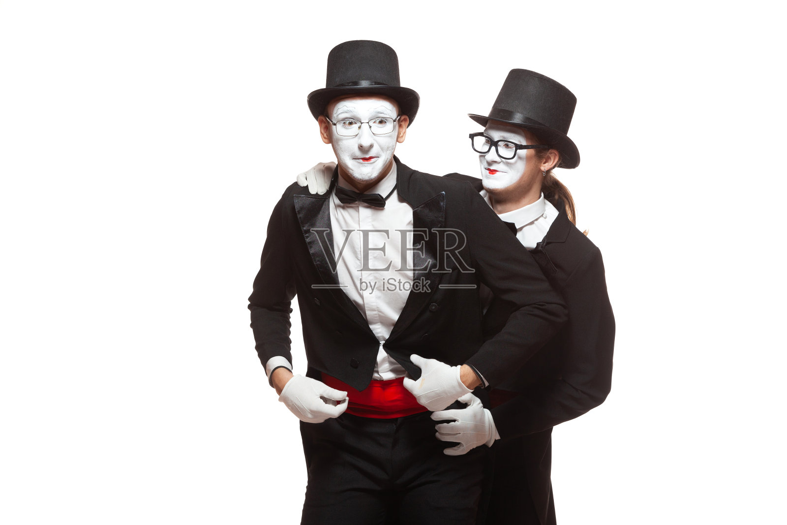 两位哑剧演员的表演，白色背景照片摄影图片