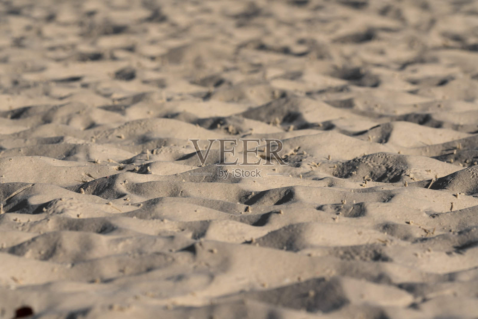 沙滩表面，背景和纹理。照片摄影图片