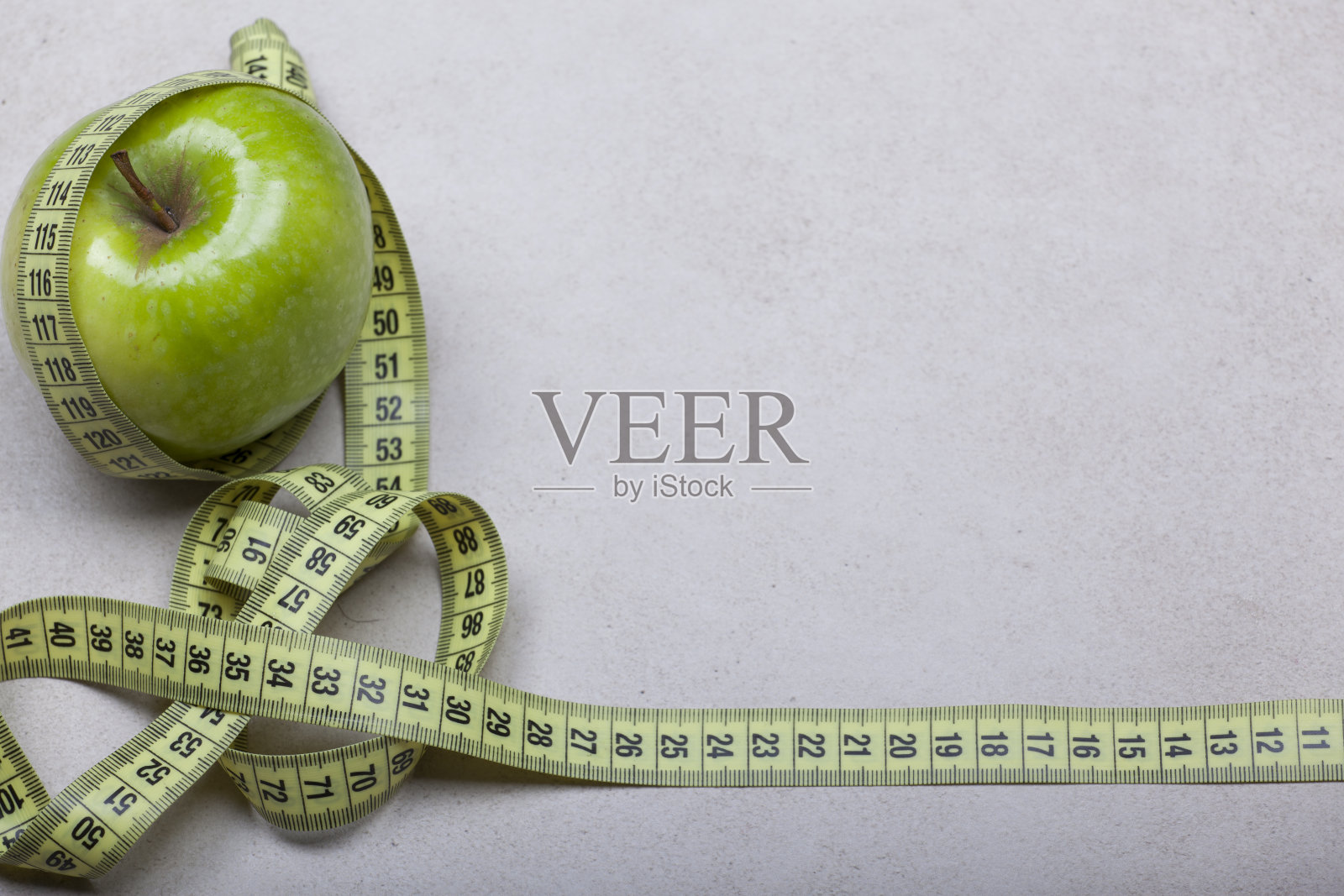 绿色和红色的大苹果照片摄影图片