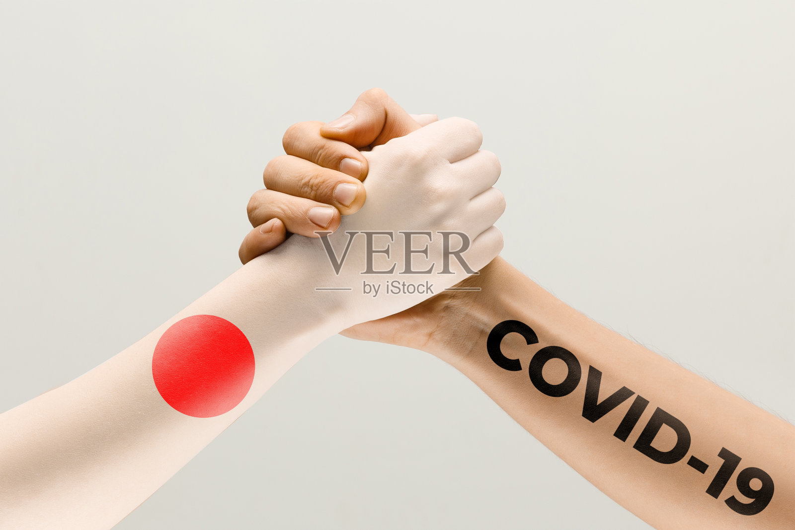 日本国旗涂色手与冠状病毒照片摄影图片