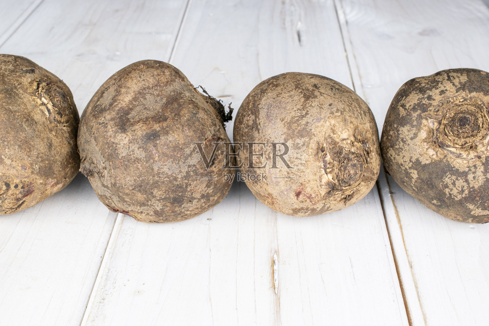 灰色木材上的甜菜根照片摄影图片