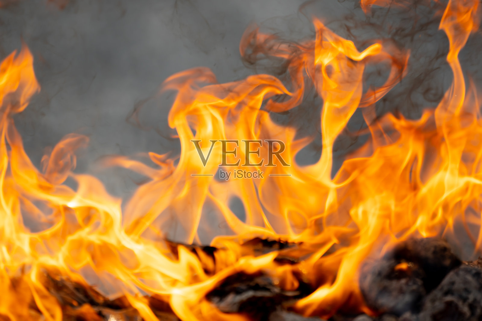 火焰燃烧的背景发光照片摄影图片