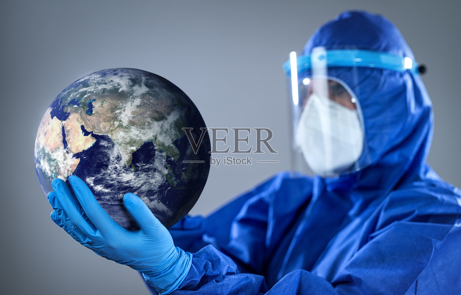 保护世界免受新冠疫情影响照片摄影图片