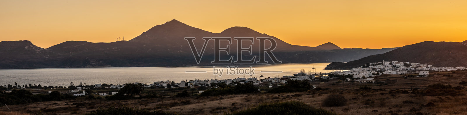 米洛斯湾的日落全景照片摄影图片