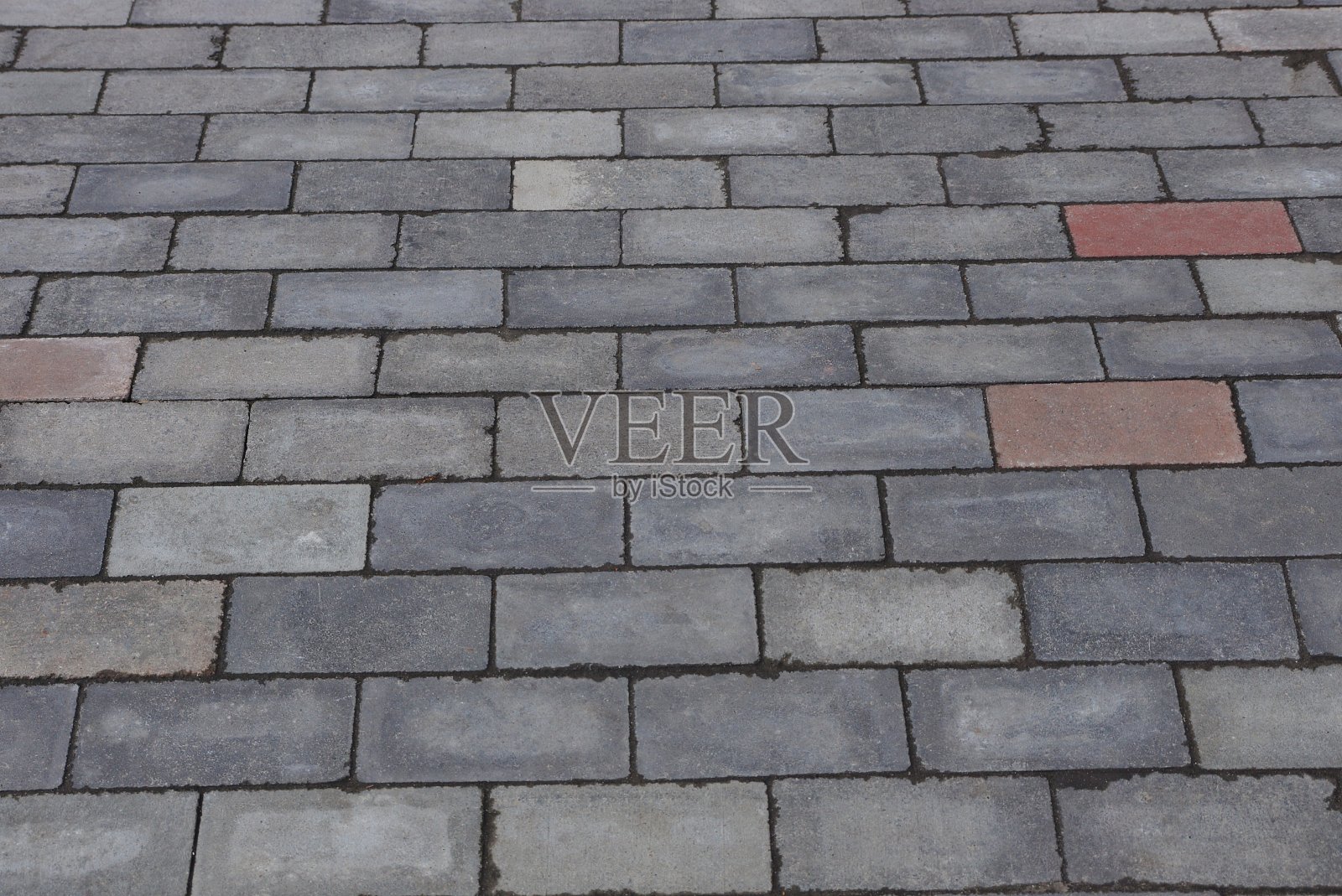 路面背景为棕色灰色的石头照片摄影图片