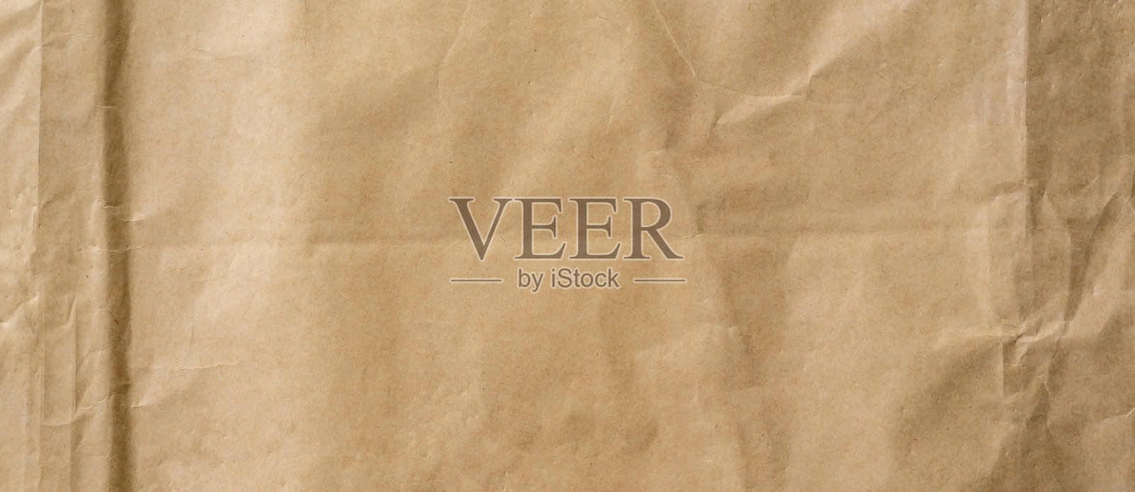 皱巴巴的牛皮纸背景和纹理与复制空间。照片摄影图片