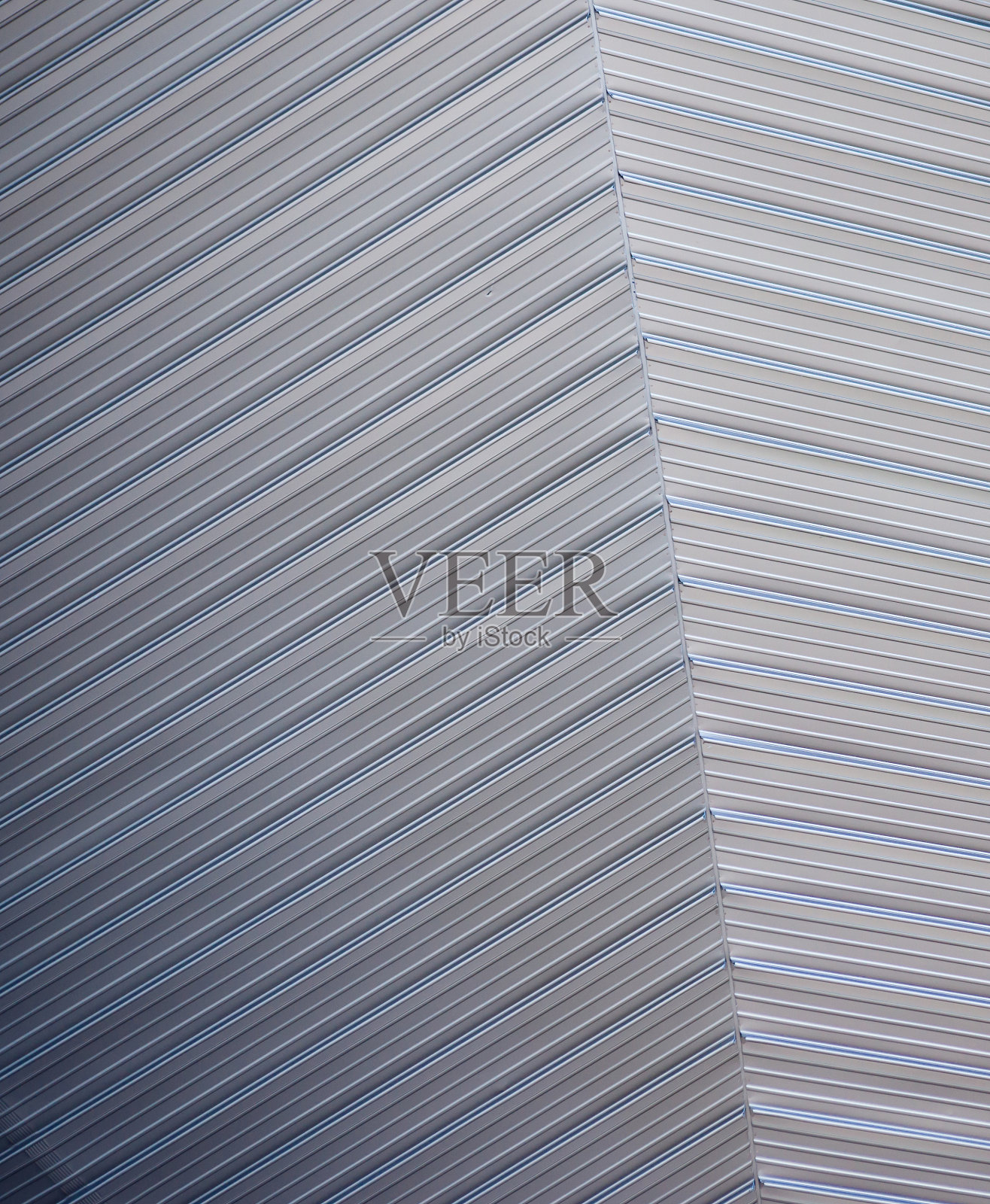 灰色的金属质感。挠金属质感。设计背景。照片摄影图片