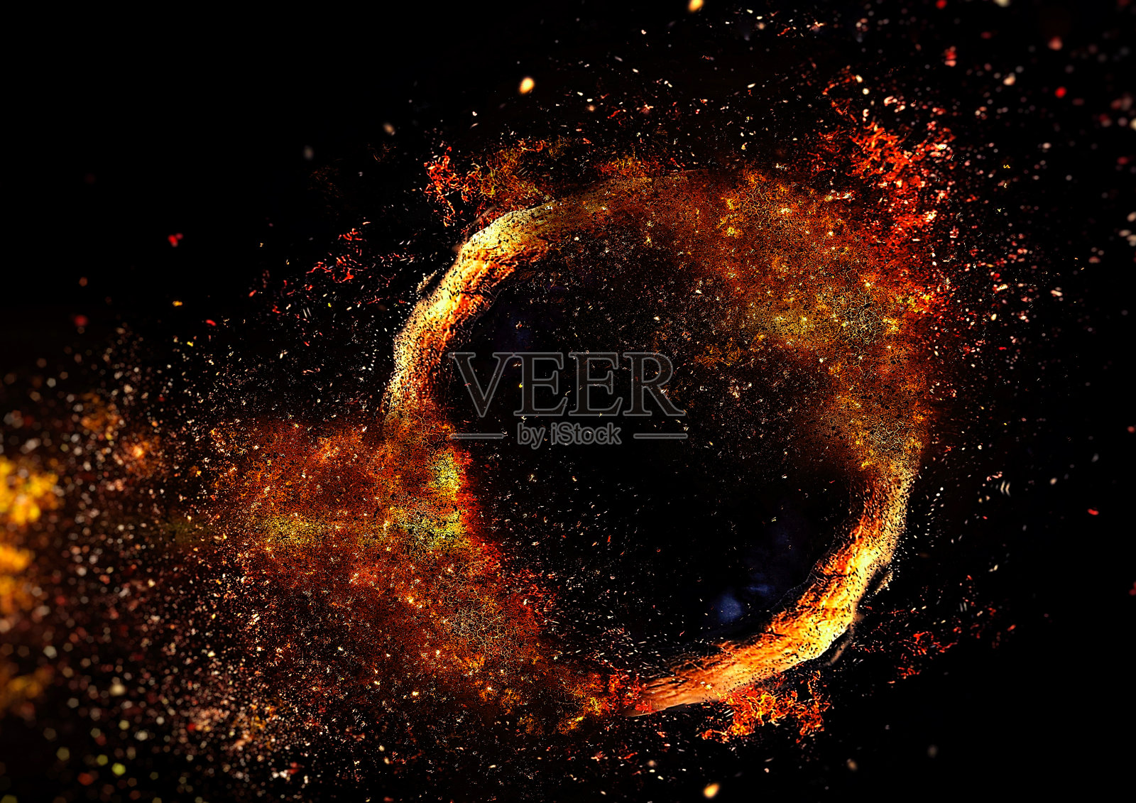 一圈燃烧的绳子在黑暗中漂浮照片摄影图片