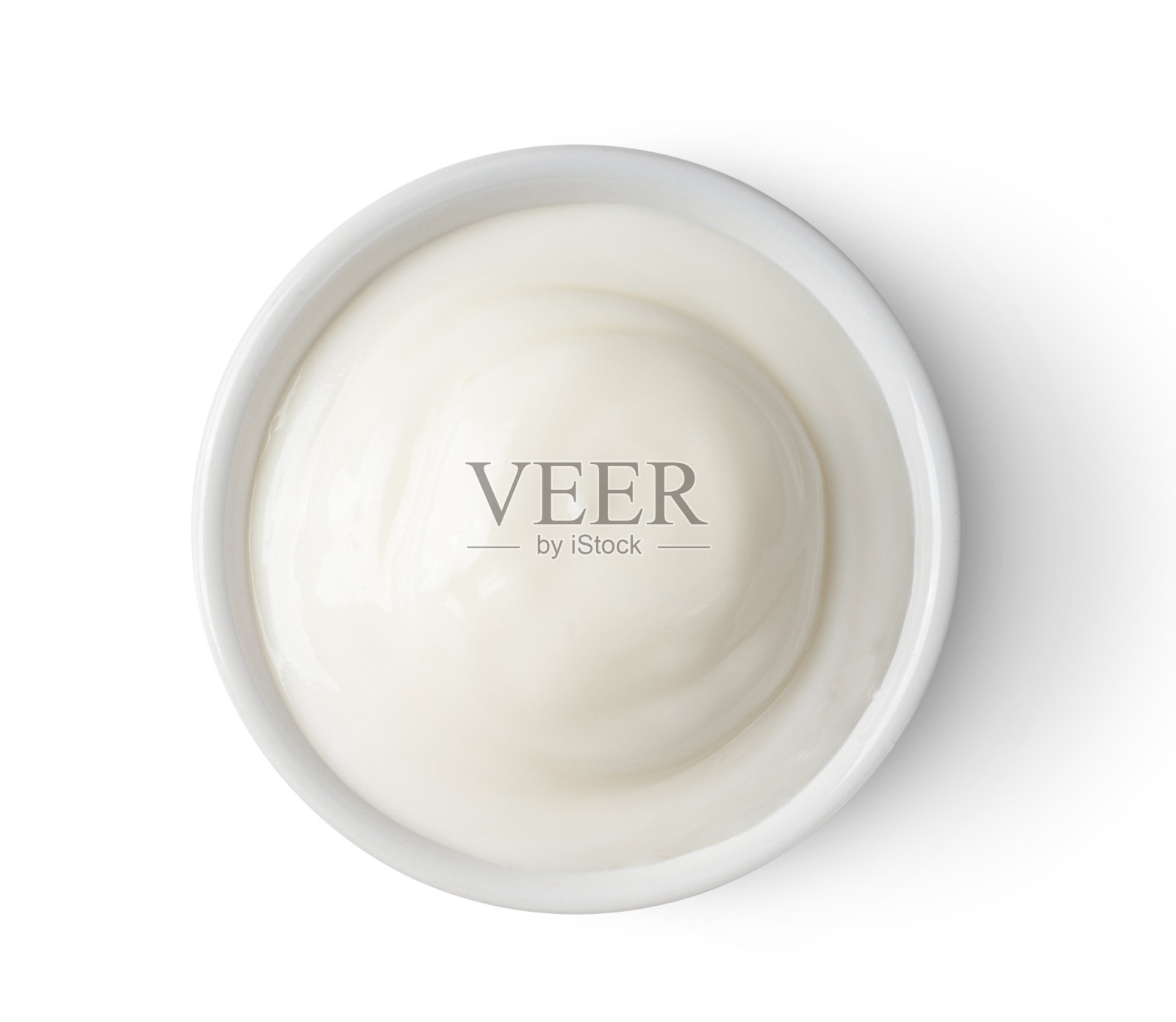 从俯视图看，一碗酸奶孤立在白色背景上照片摄影图片