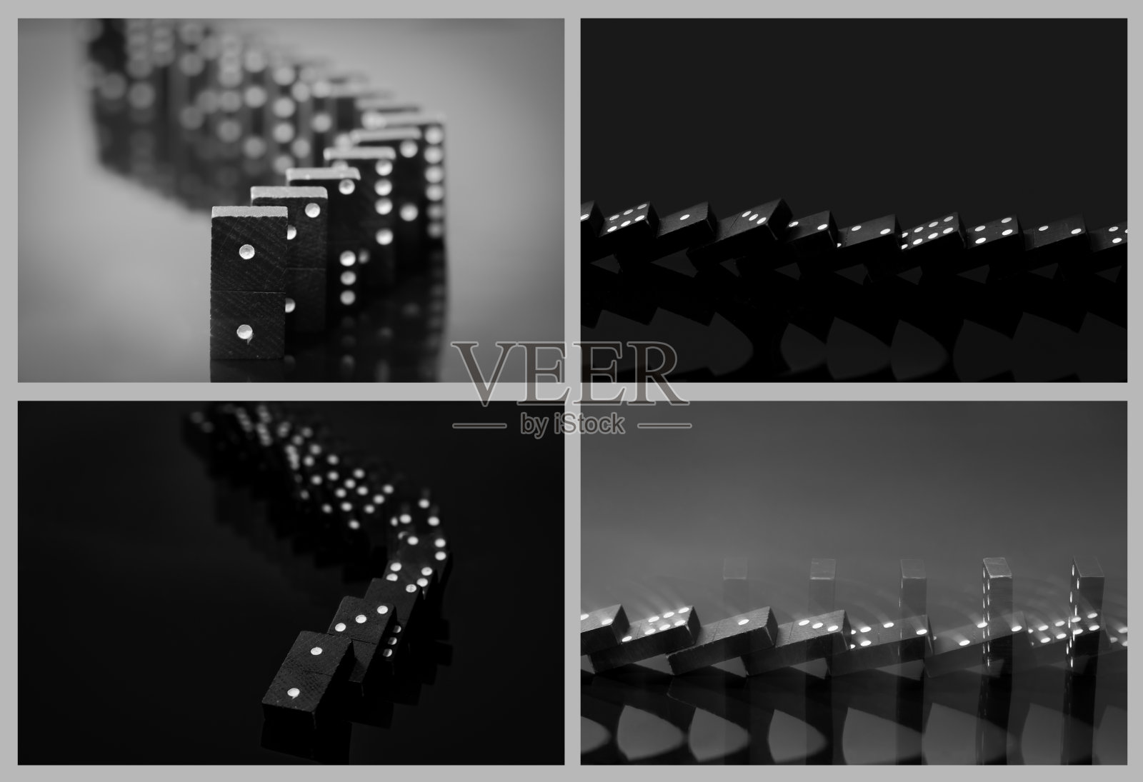 黑色背景上的一排排多米诺骨牌。全尺寸。照片摄影图片