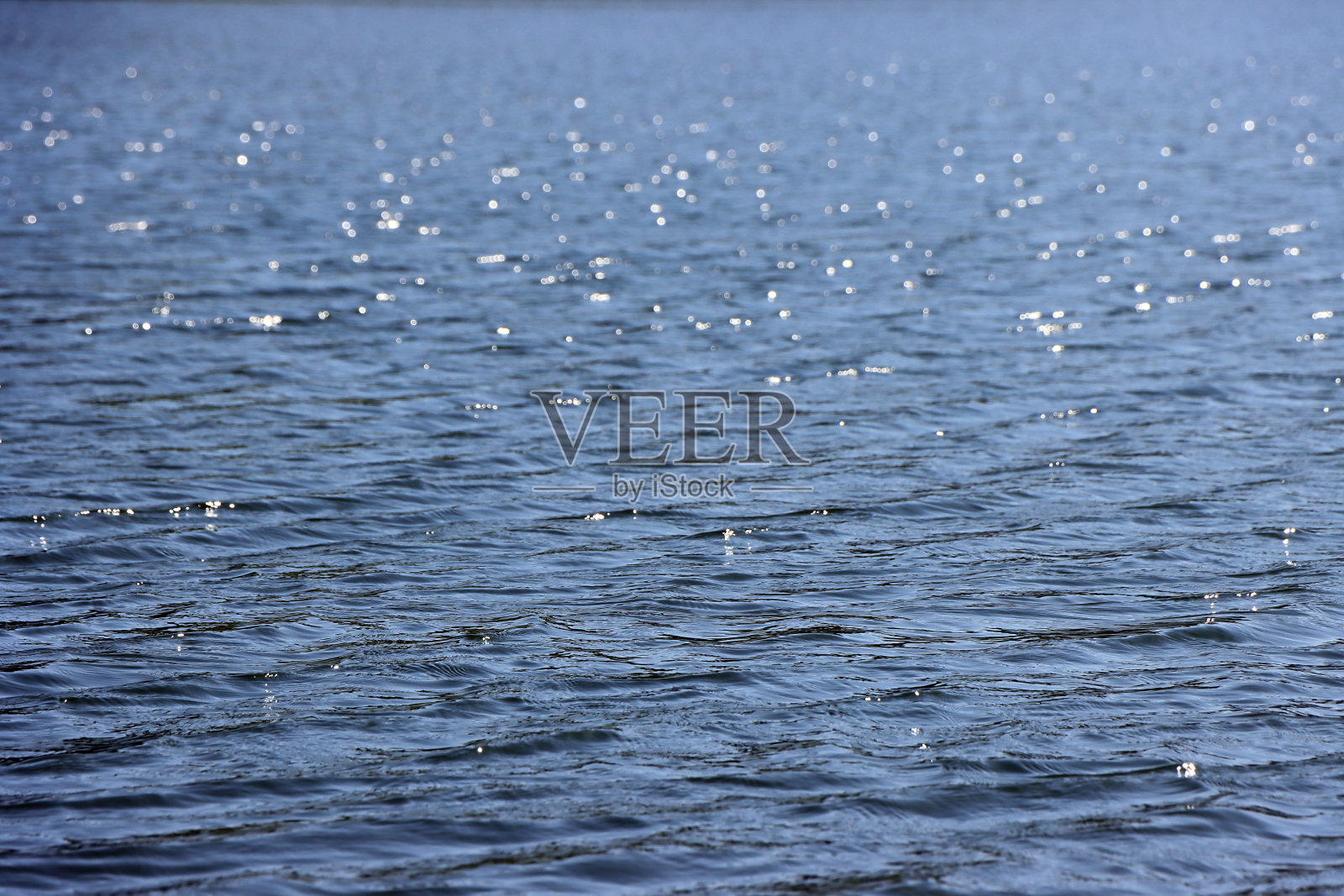 高架视图的蓝色水面抽象在一个水坝的照片照片摄影图片