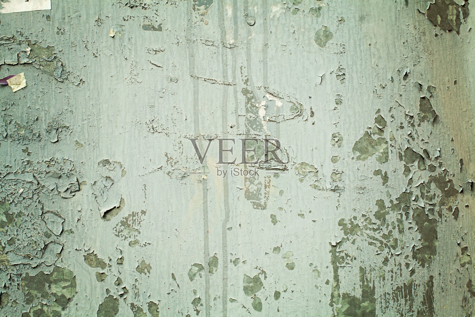 旧的绿色纹理墙的背景。完美的背景与空间。照片摄影图片