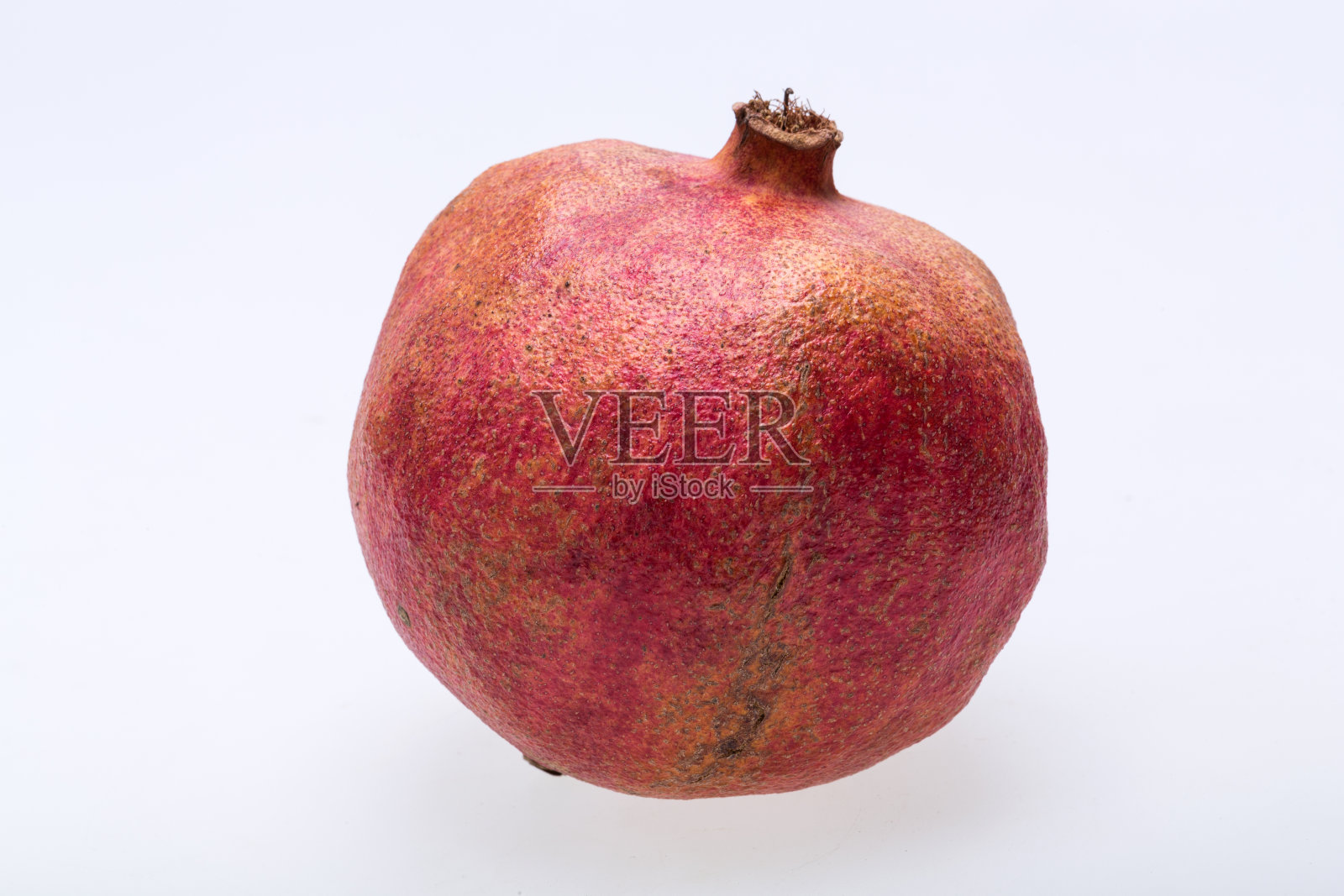 孤立在白色背景上的红石榴照片摄影图片