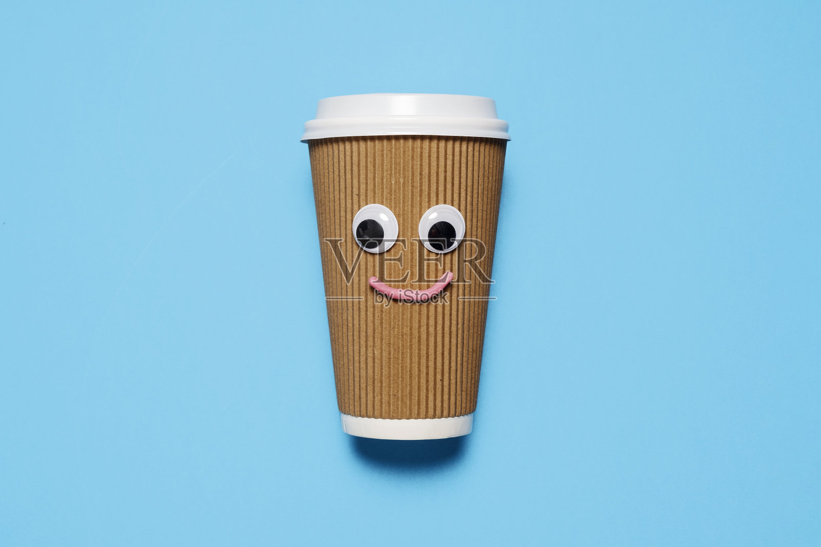 快乐微笑一次性咖啡杯照片摄影图片