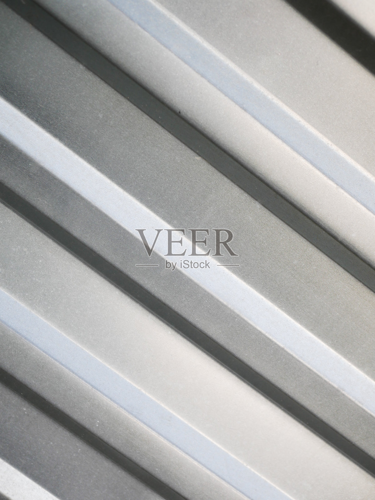 金属栅栏特写。有棱纹的灰色。为题词的地方。项目背景照片摄影图片