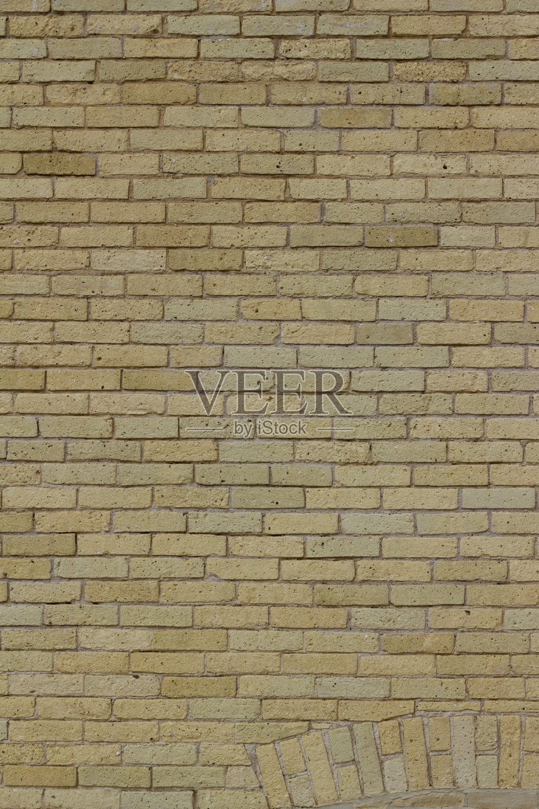 迷人的老黄砖墙背景，破旧别致的风化纹理照片摄影图片