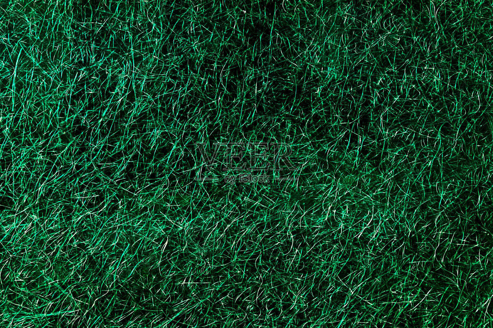 抽象绿色塑料纤维片的背景、纹理或表面照片摄影图片