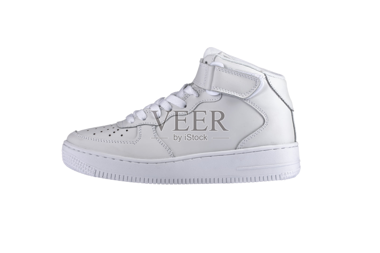 运动鞋子。白色的运动鞋在白色的背景。照片摄影图片