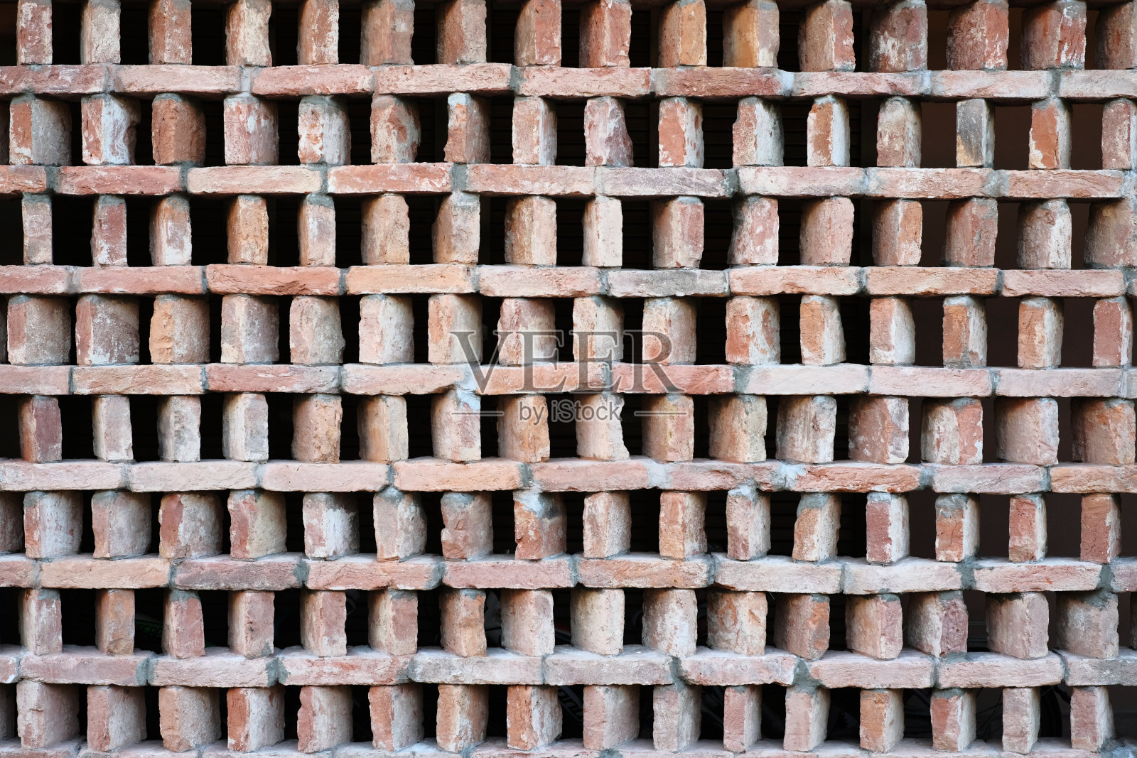 全框架几何背景由陶土砖堆叠而成照片摄影图片