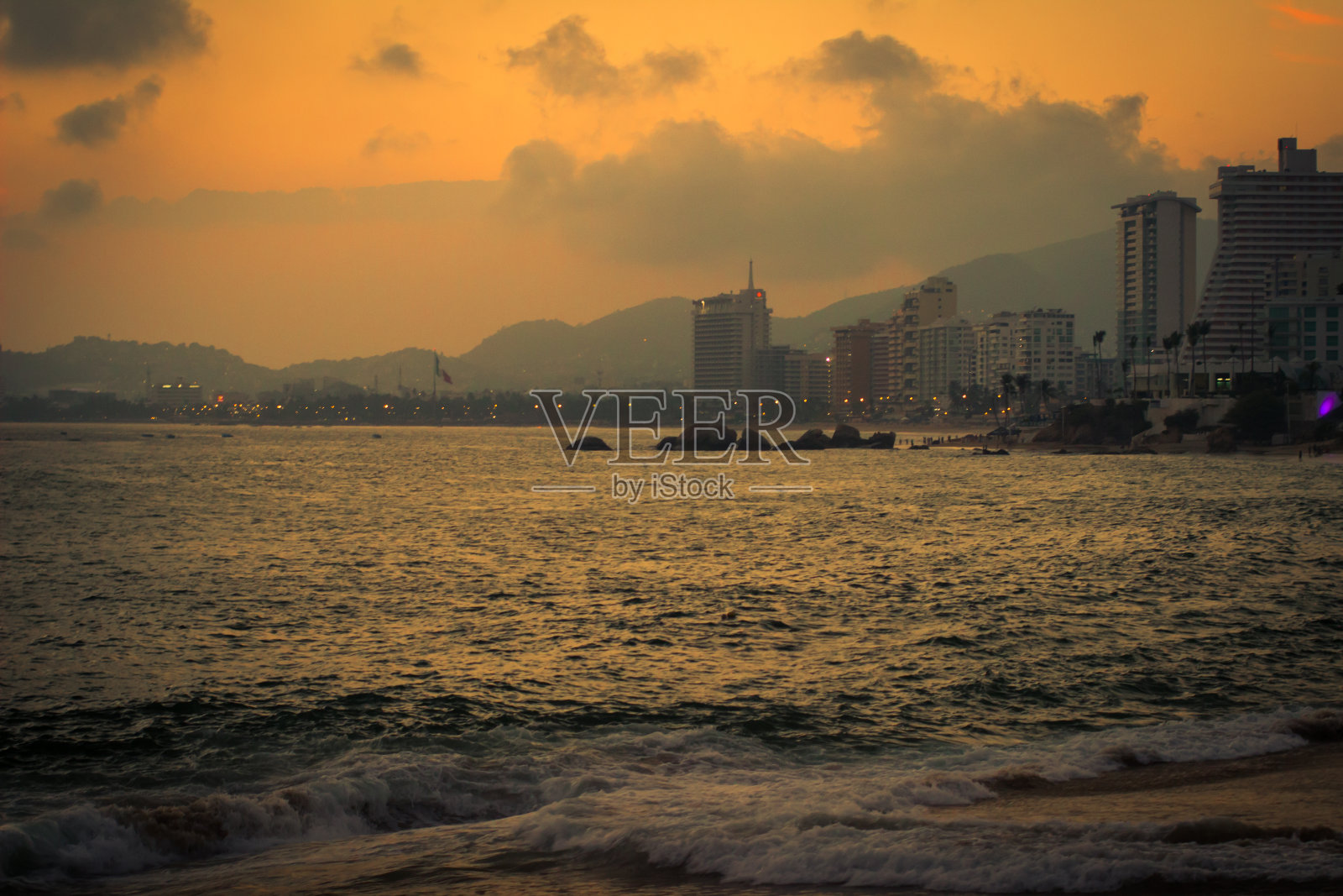 日落在阿卡普尔科照片摄影图片