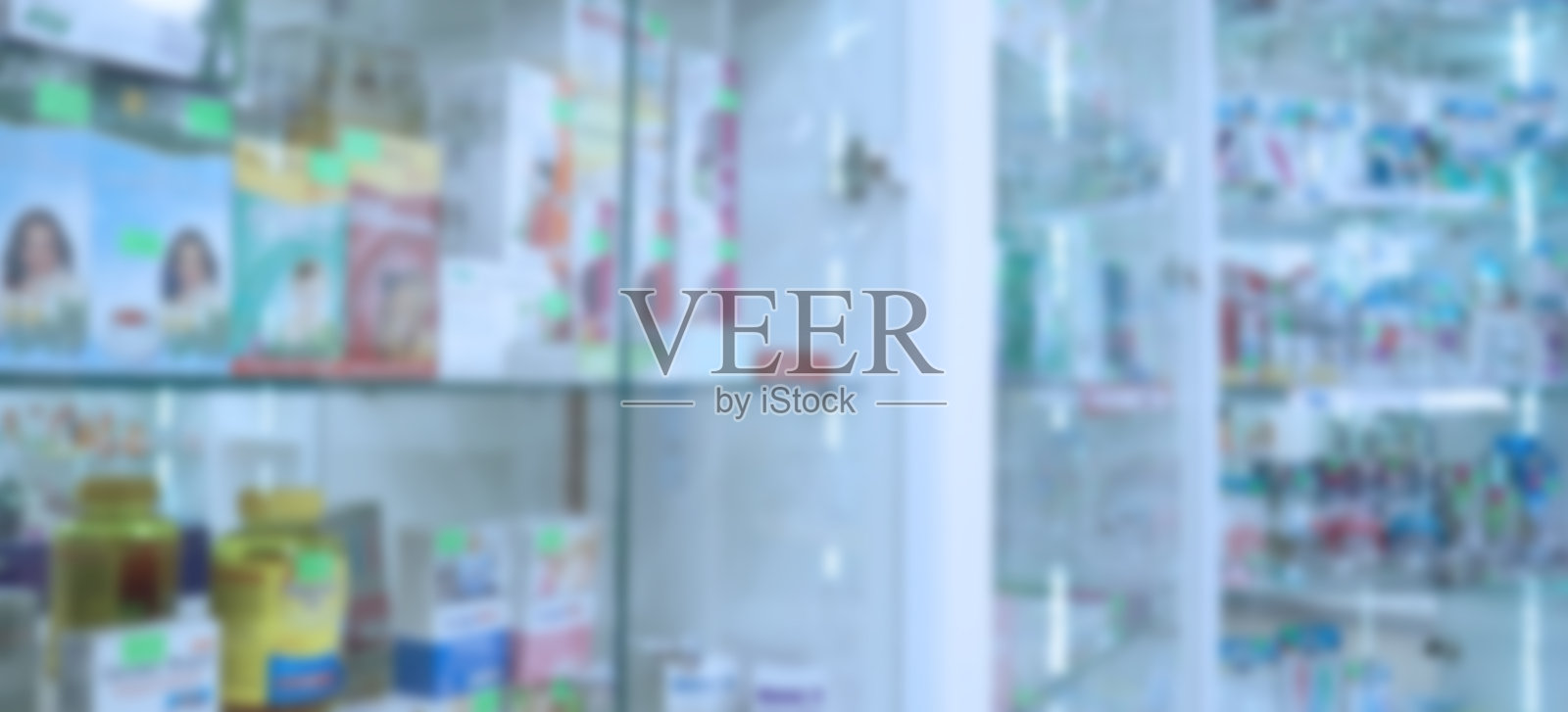 模糊图像的货架上的药品在药房。医学概念。横幅。照片摄影图片