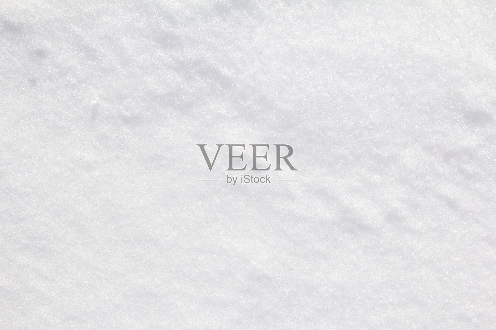 特写白色冰雪雪表面纹理背景。照片摄影图片